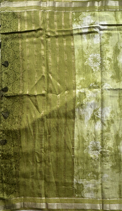 Dola Crepe Saree Leaf Green Colored Elegantly Paired with a Zari Border. - Sampradaya Designer Studio