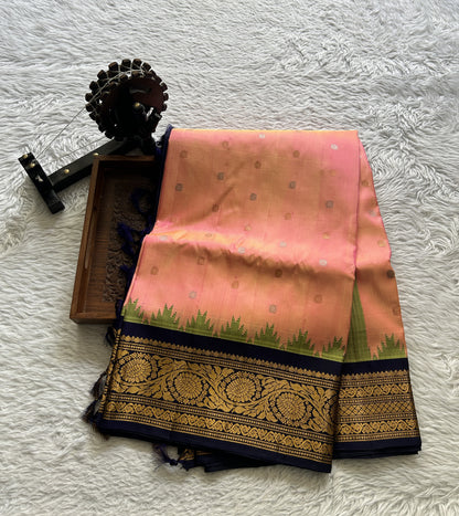 Gadwal Silk Saree Peach Colored Complemented With a Ink Blue Color Zari Border - Sampradaya Designer Studio