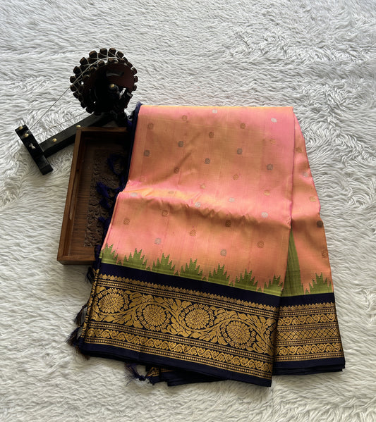 Gadwal Silk Saree Peach Colored Complemented With a Ink Blue Color Zari Border - Sampradaya Designer Studio