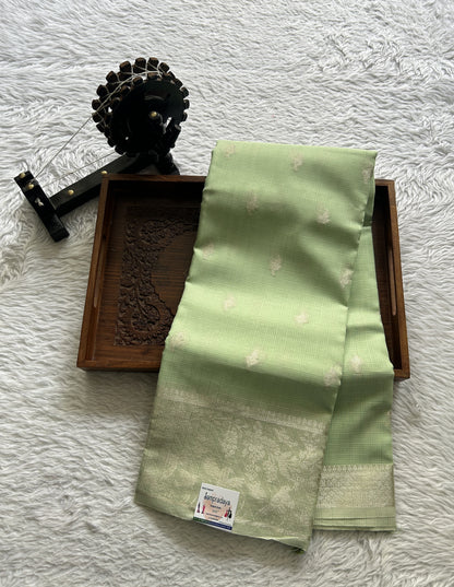 Silk kota Saree Light Green colored Complemented with a Zari Border. - Sampradaya Designer Studio