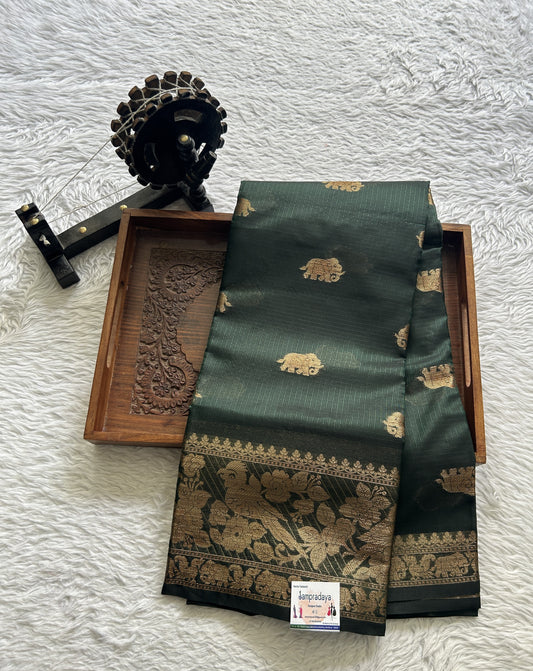 Silk kota Saree Bottle Green colored Complemented with a Zari Border. - Sampradaya Designer Studio