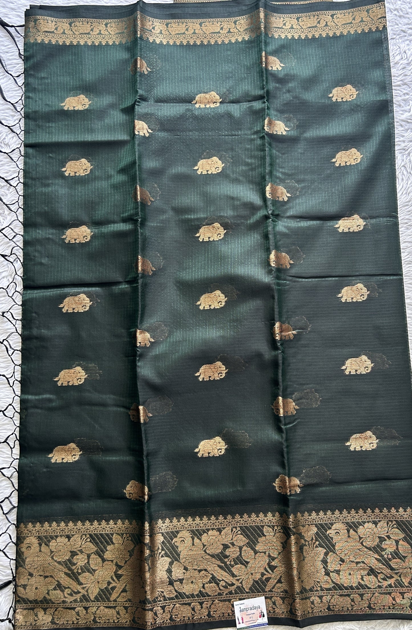 Silk kota Saree Bottle Green colored Complemented with a Zari Border. - Sampradaya Designer Studio