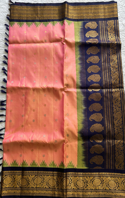 Gadwal Silk Saree Peach Colored Complemented With a Ink Blue Color Zari Border - Sampradaya Designer Studio