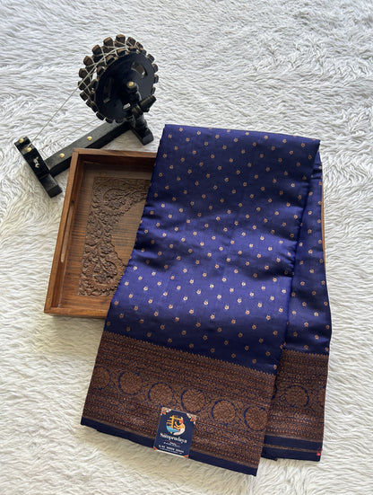 Raw Mango or Pooniya Silk Saree Ink Blue Colored Complemented With a Zari Border - Sampradaya Designer Studio