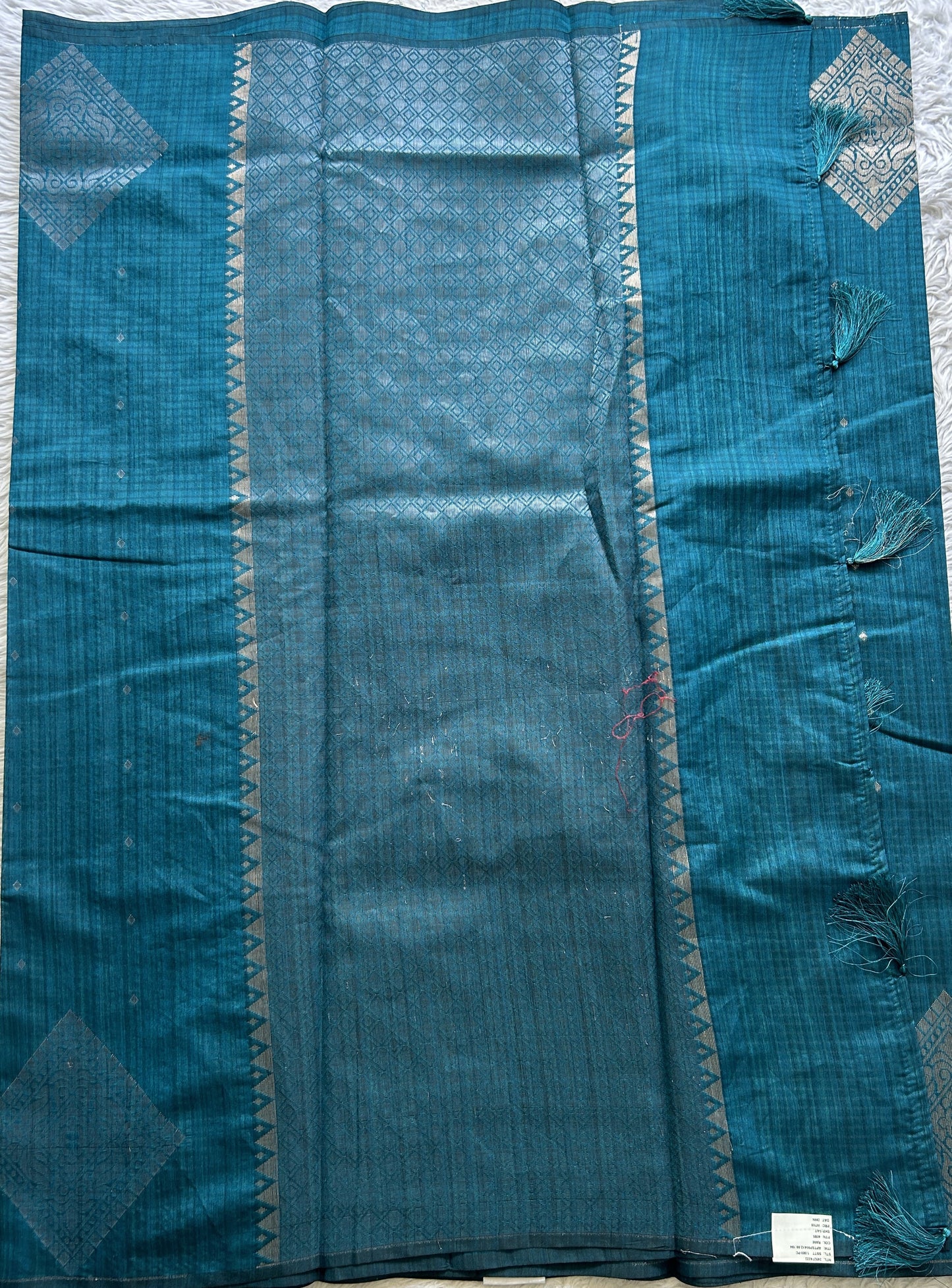 Semi Tussar Saree Peacock Blue Colored complemented with a Borderless. - Sampradaya Designer Studio