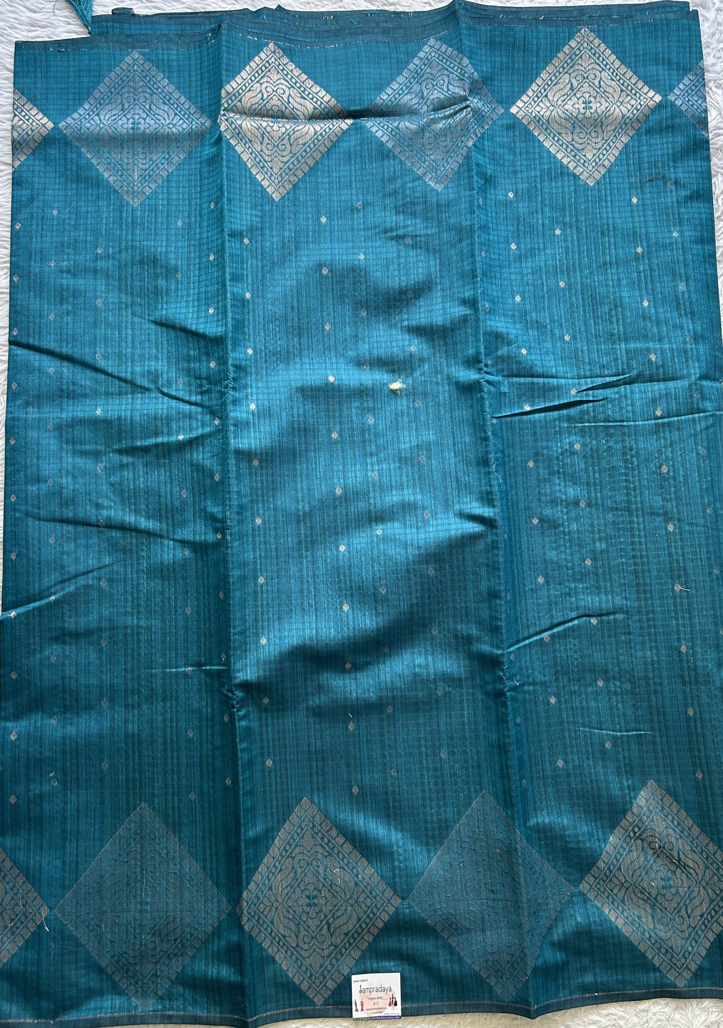 Semi Tussar Saree Peacock Blue Colored complemented with a Borderless. - Sampradaya Designer Studio