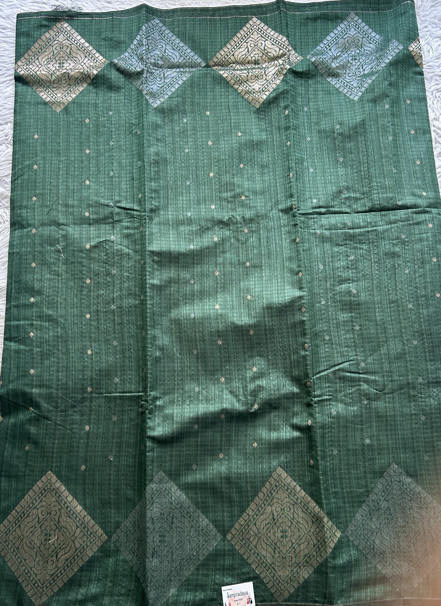 Semi Tussar Saree Bottle Green Colored complemented with a Borderless. - Sampradaya Designer Studio