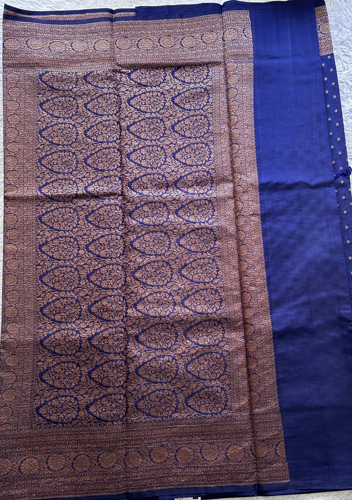 Raw Mango or Pooniya Silk Saree Ink Blue Colored Complemented With a Zari Border - Sampradaya Designer Studio