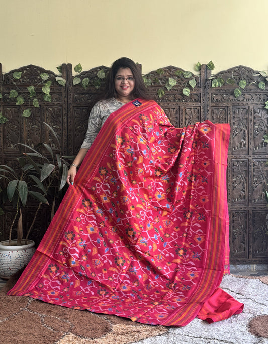 Ikkat Pattu Saree Hot Pink colored complemented with a Patola border. - Sampradaya Designer Studio