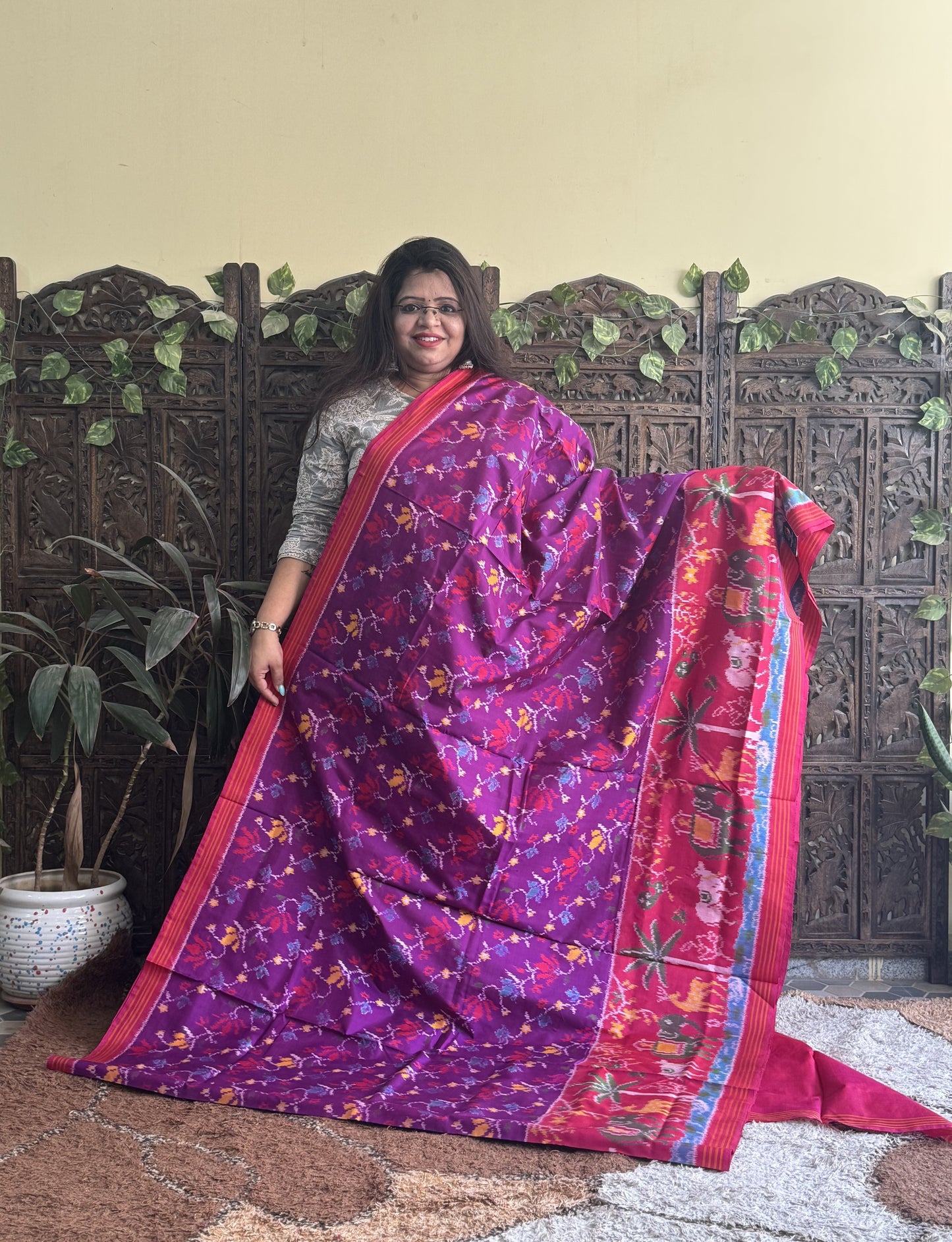 Ikkat Pattu Saree Violet colored complemented with a Pink Ikkat border. - Sampradaya Designer Studio