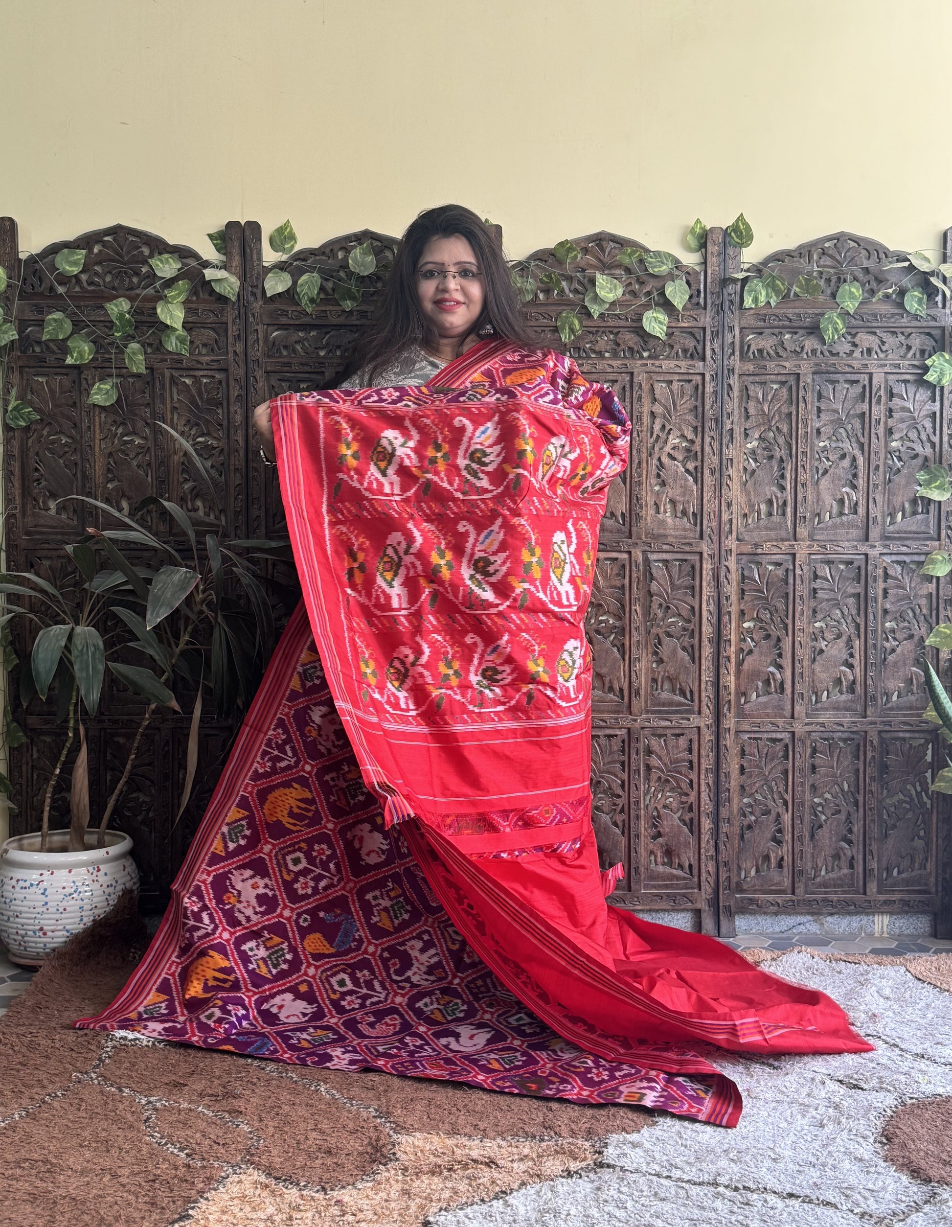 Ikkat Pattu Saree Violet colored complemented with a Red Patolla border. - Sampradaya Designer Studio