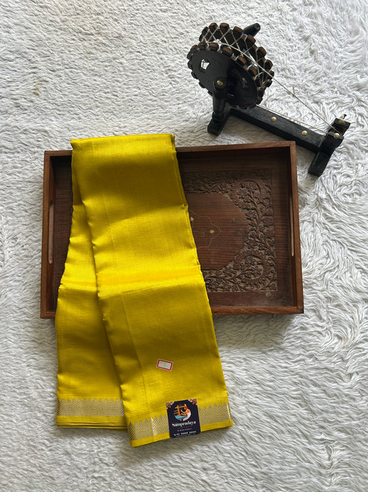 Mangalagiri Plain Pattu Saree Yellow colored complemented with a Zari Border. - Sampradaya Designer Studio
