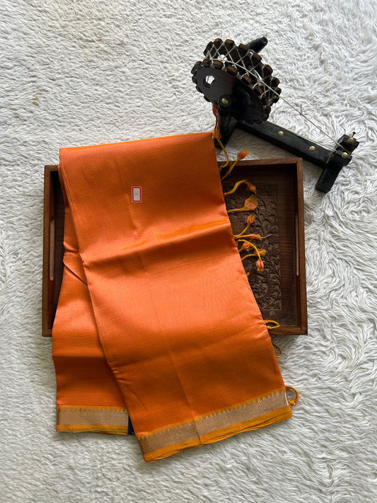 Mangalagiri Plain Pattu Saree Light Orange colored complemented with a Zari Border. - Sampradaya Designer Studio