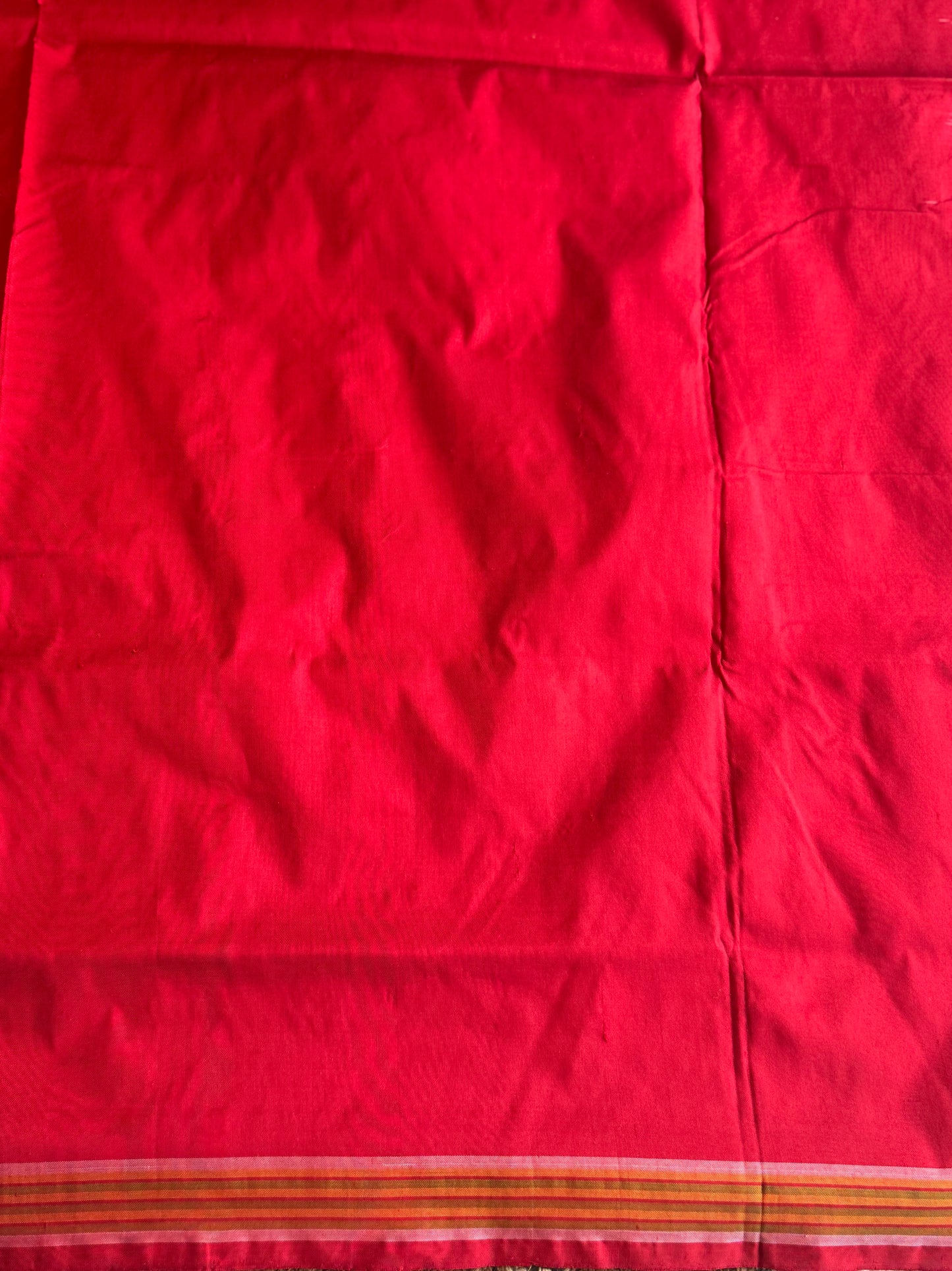 Ikkat Pattu Saree Dark Purple colored complemented with a Red Patolla border. - Sampradaya Designer Studio