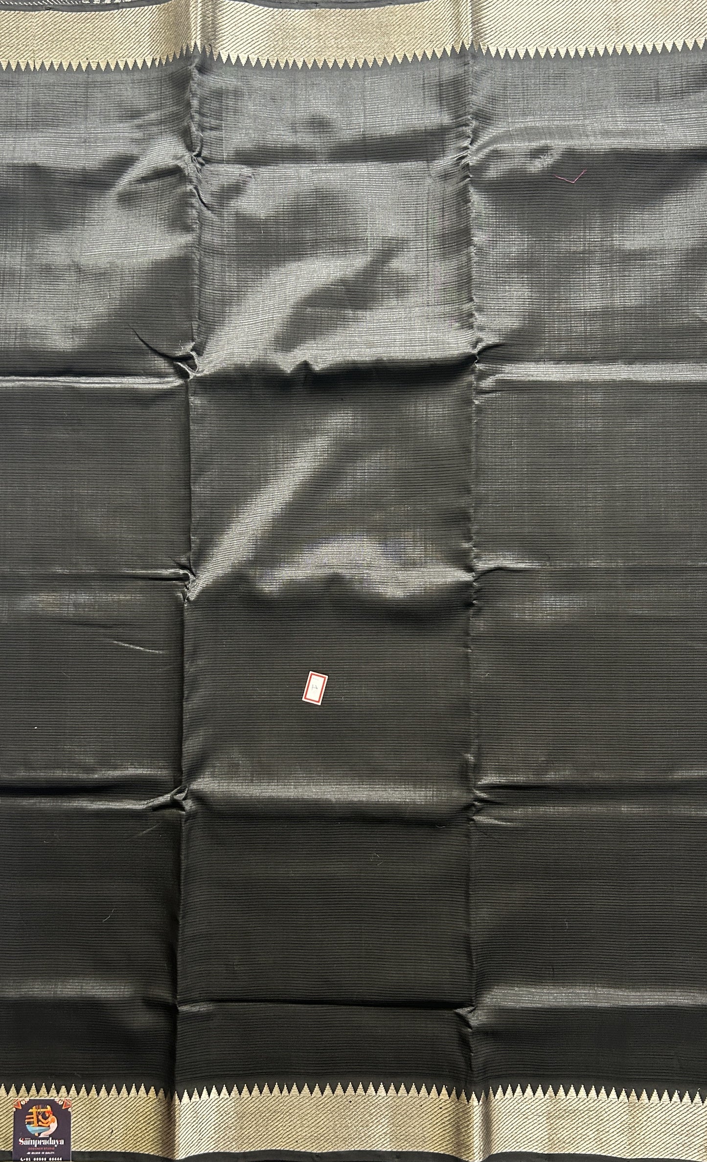 Mangalagiri Plain Pattu Saree Black colored complemented with a Zari Border. - Sampradaya Designer Studio