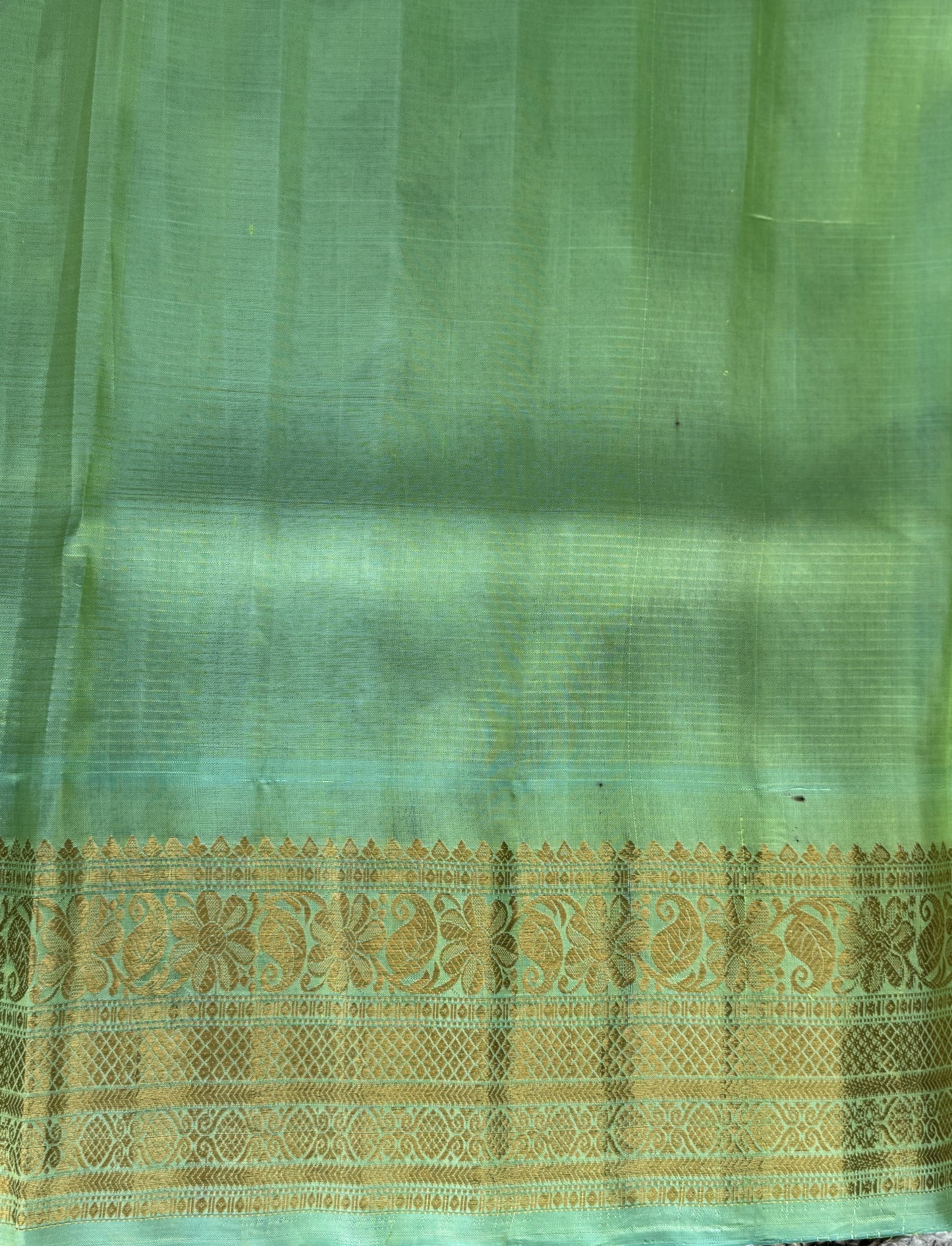 Gadwal Silk Saree Light Neon Green Colored Complemented With a Zari Border - Sampradaya Designer Studio