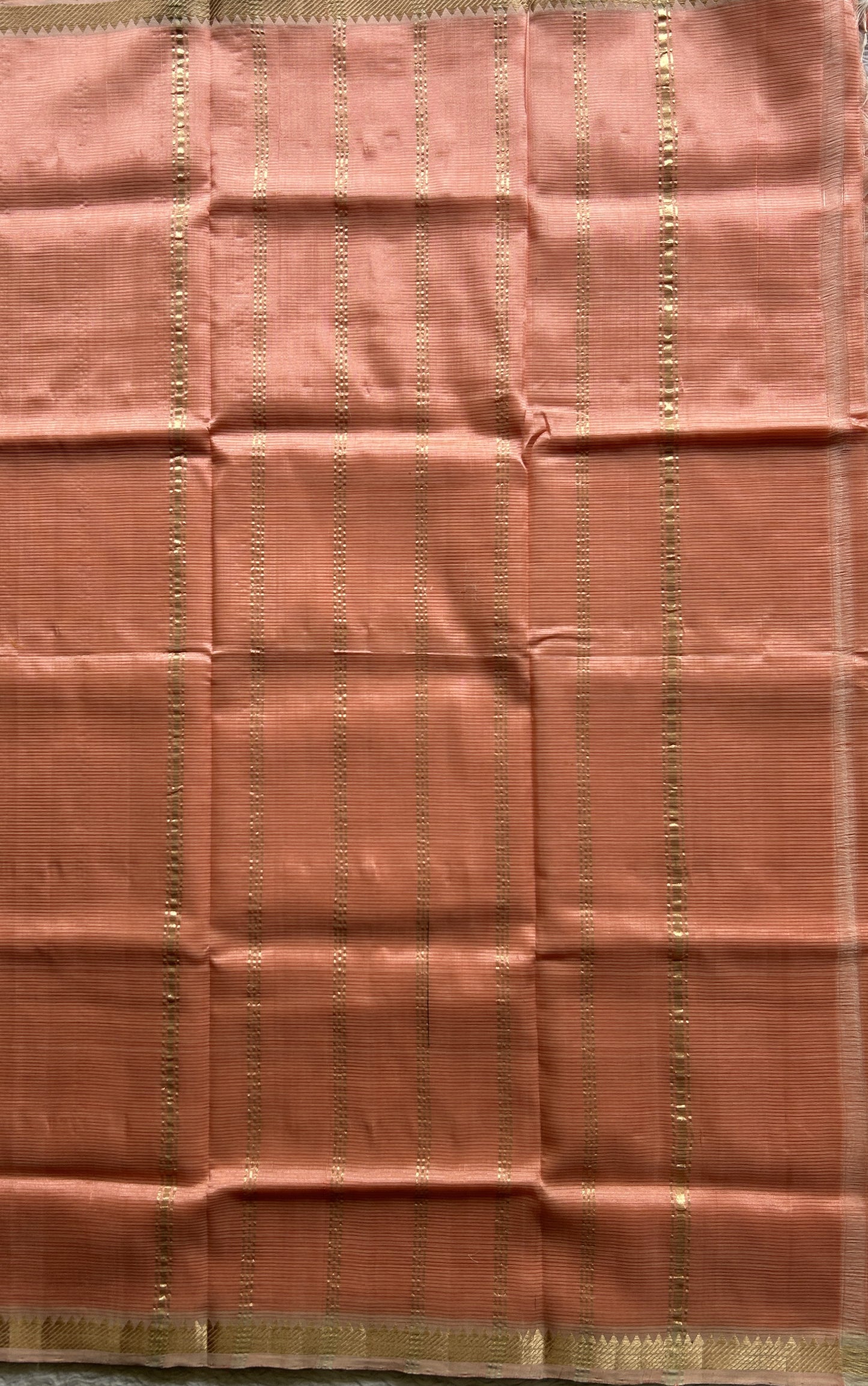 Mangalagiri Plain Pattu Saree Peach colored complemented with a Zari Border. - Sampradaya Designer Studio