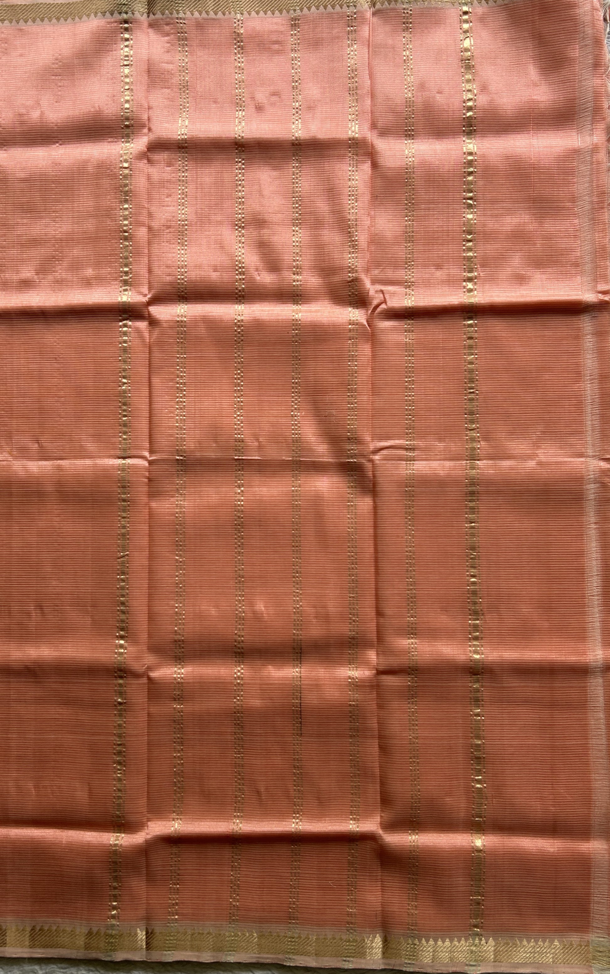 Mangalagiri Plain Pattu Saree Peach colored complemented with a Zari Border. - Sampradaya Designer Studio