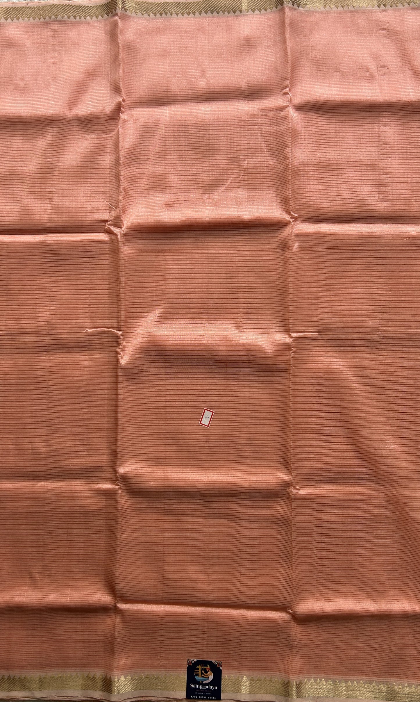 Mangalagiri Plain Pattu Saree Peach colored complemented with a Zari Border. - Sampradaya Designer Studio
