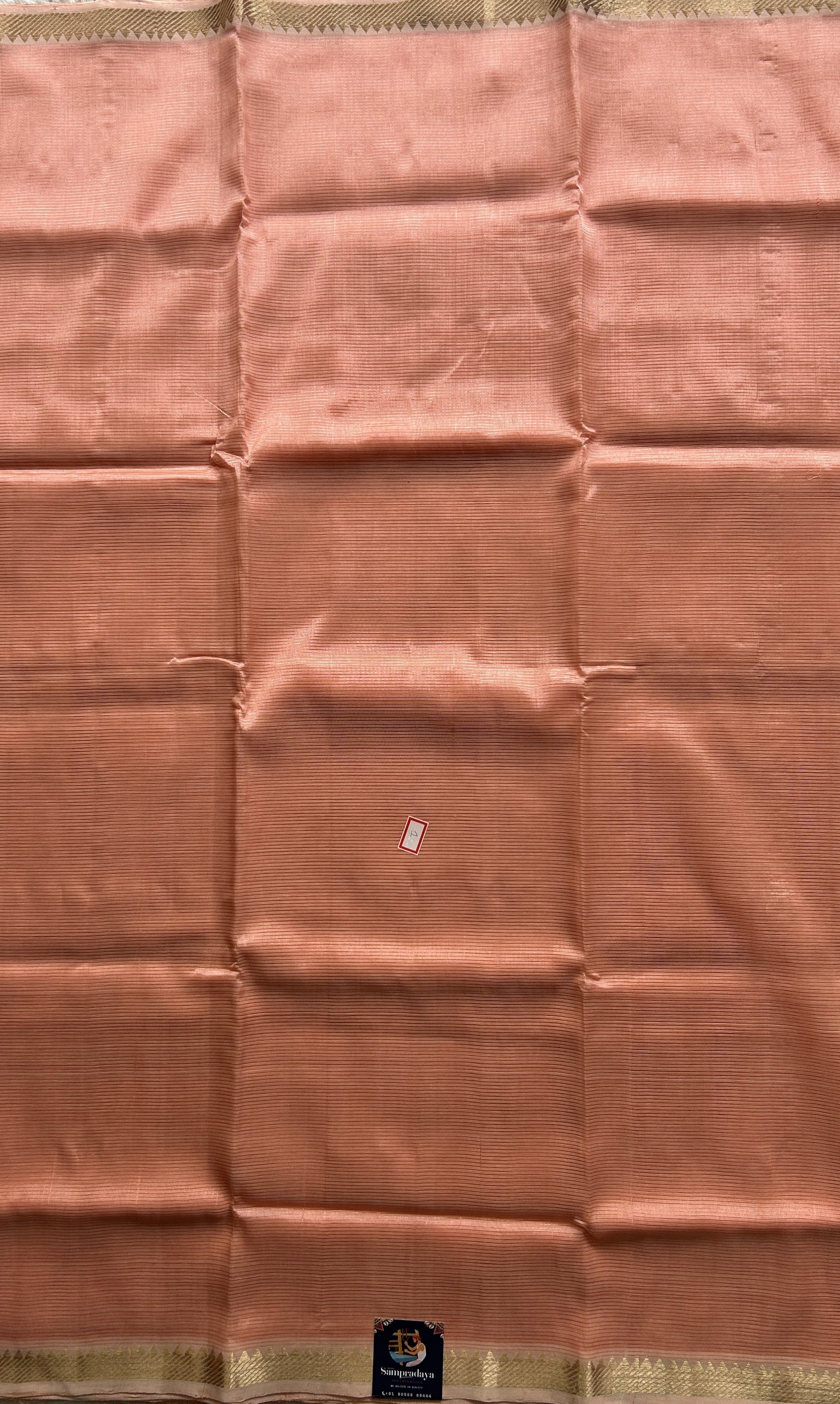 Mangalagiri Plain Pattu Saree Peach colored complemented with a Zari Border. - Sampradaya Designer Studio
