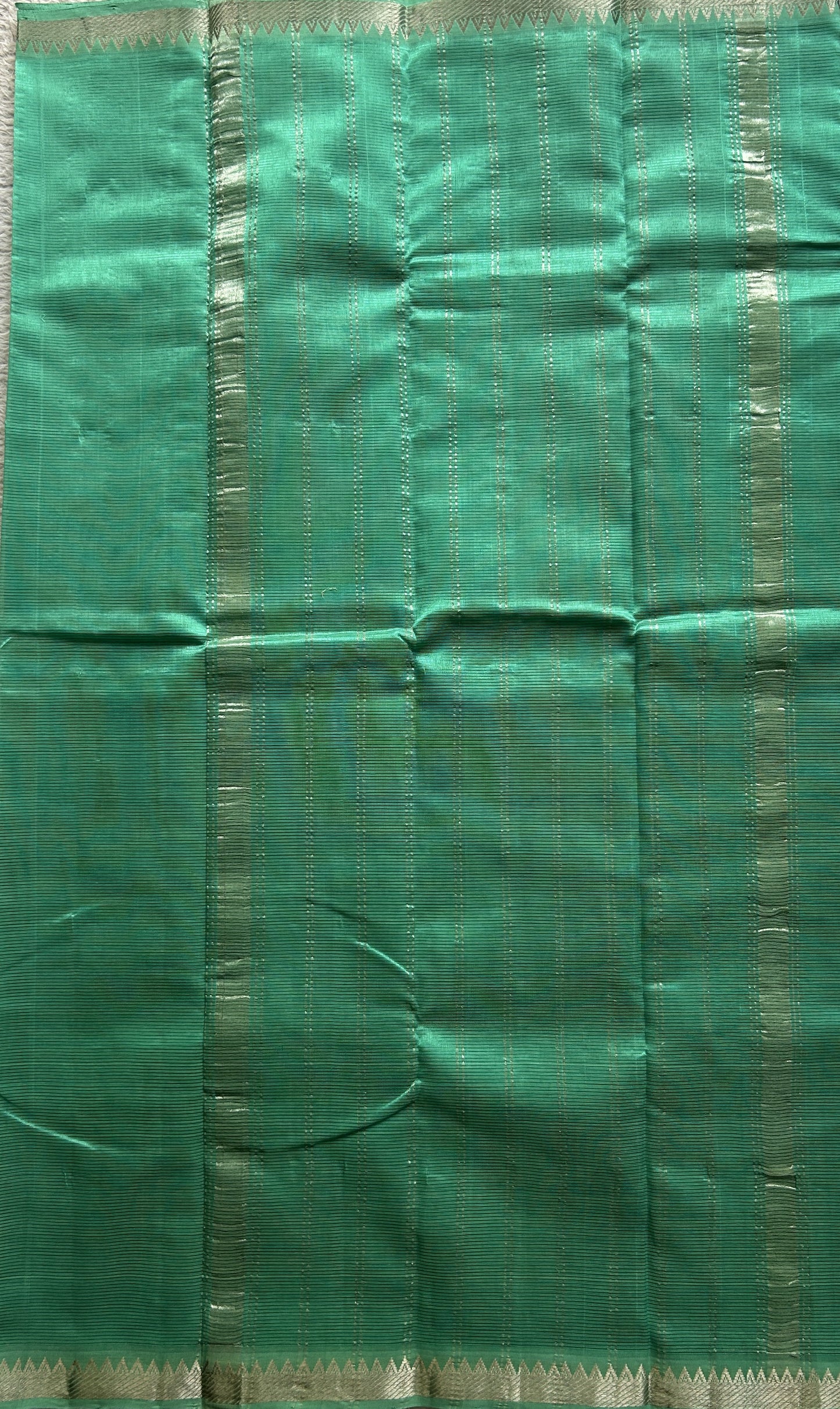 Mangalagiri Plain Pattu Saree Sea Green colored complemented with a Zari Border. - Sampradaya Designer Studio