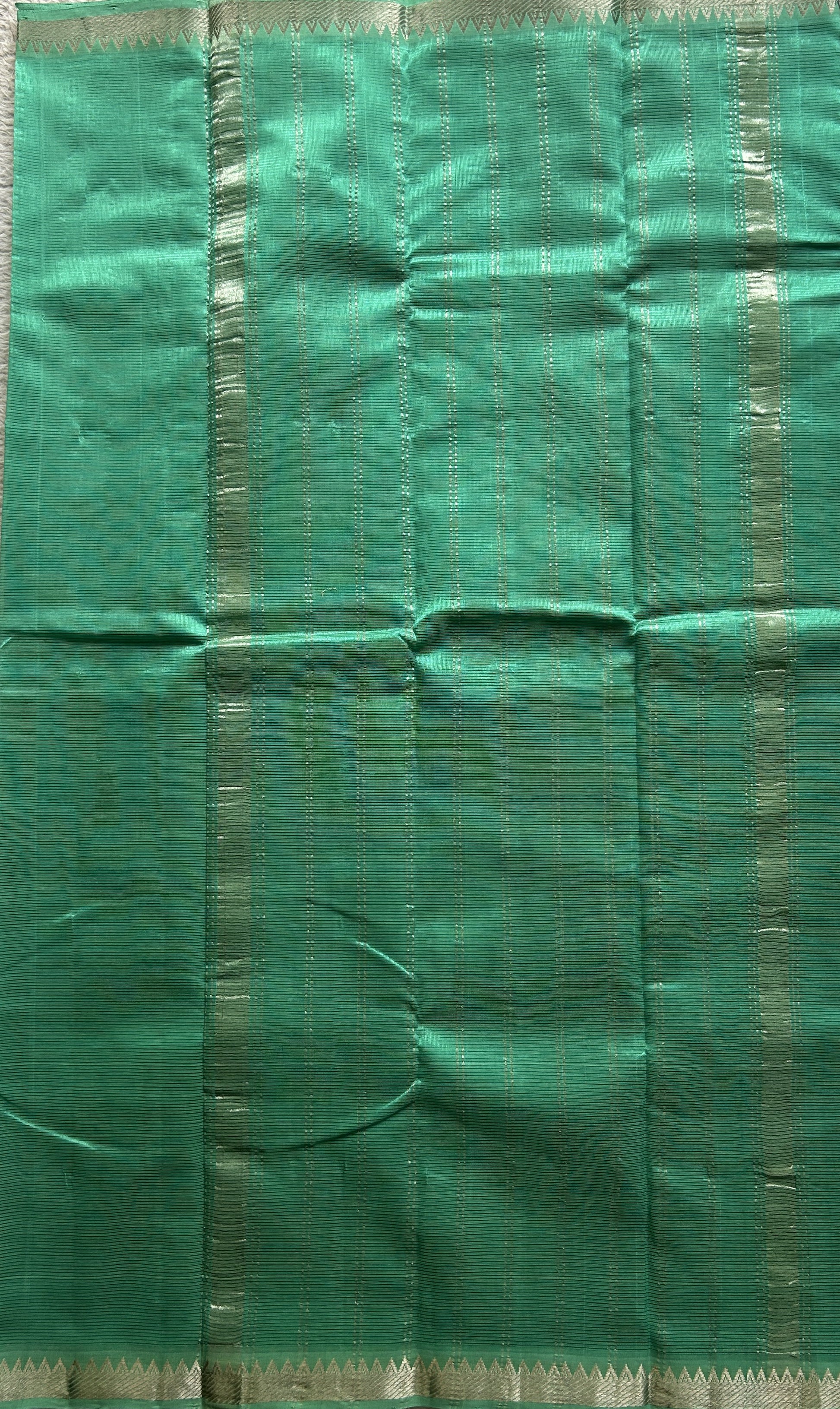 Mangalagiri Plain Pattu Saree Sea Green colored complemented with a Zari Border. - Sampradaya Designer Studio