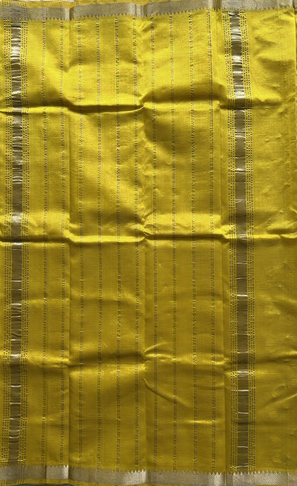 Mangalagiri Plain Pattu Saree Yellow colored complemented with a Zari Border. - Sampradaya Designer Studio