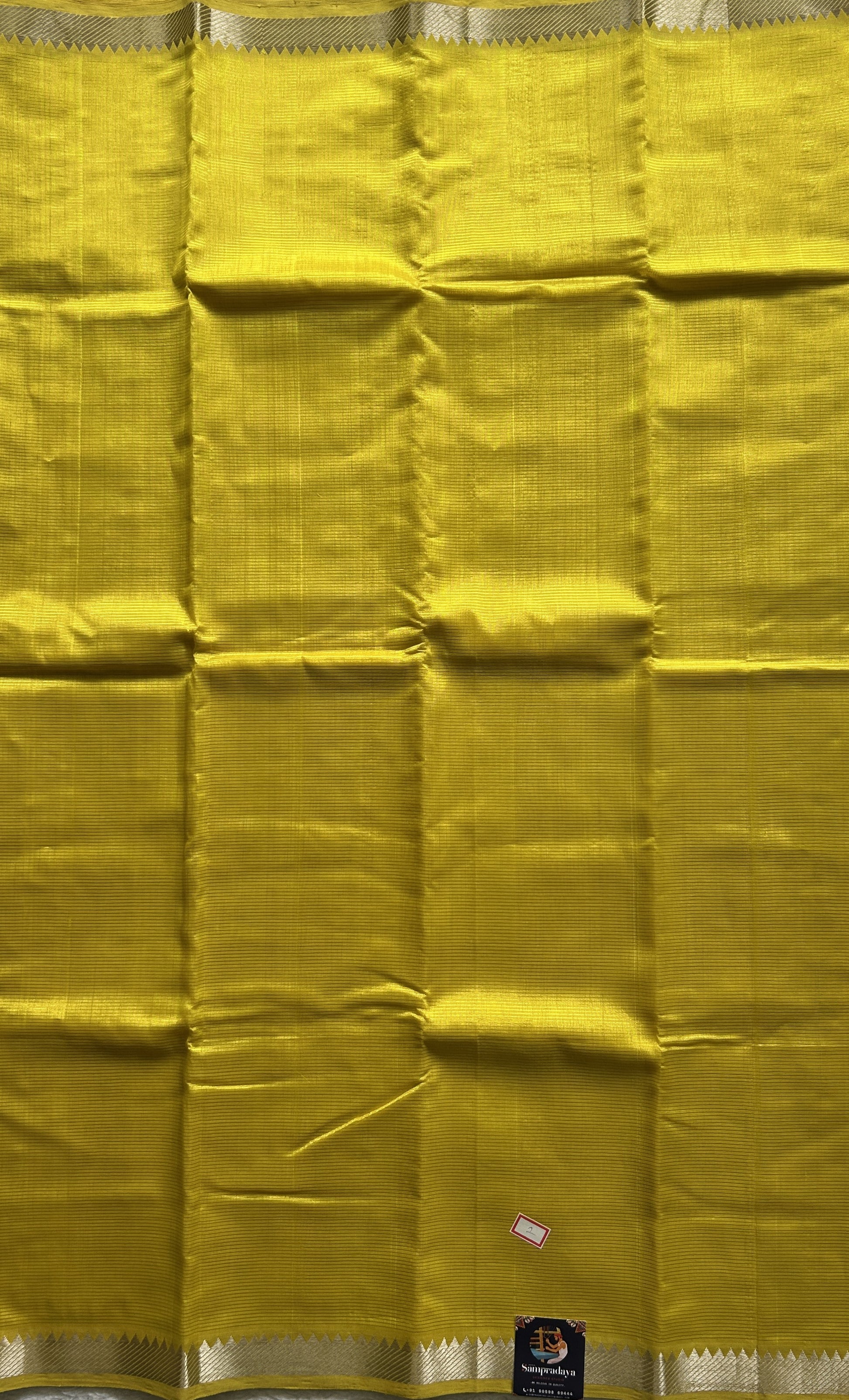 Mangalagiri Plain Pattu Saree Yellow colored complemented with a Zari Border. - Sampradaya Designer Studio