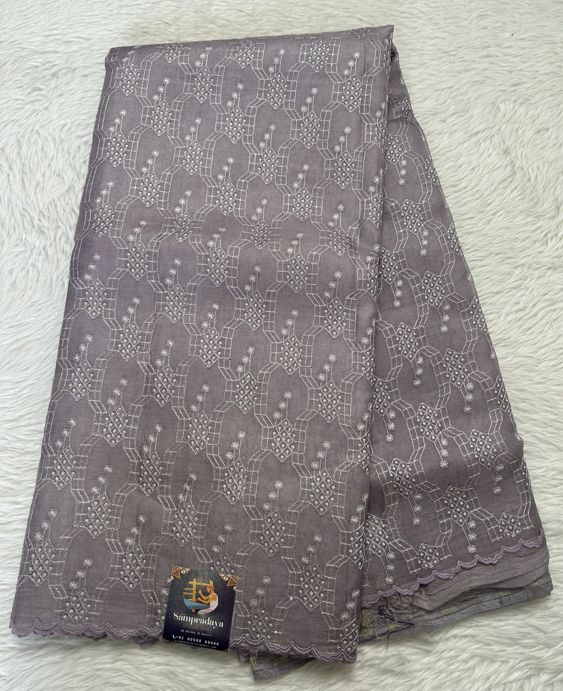 Banarasi Kora Silk Saree Light Lavender Colored Complemented with a Scallop Border. - Sampradaya Designer Studio