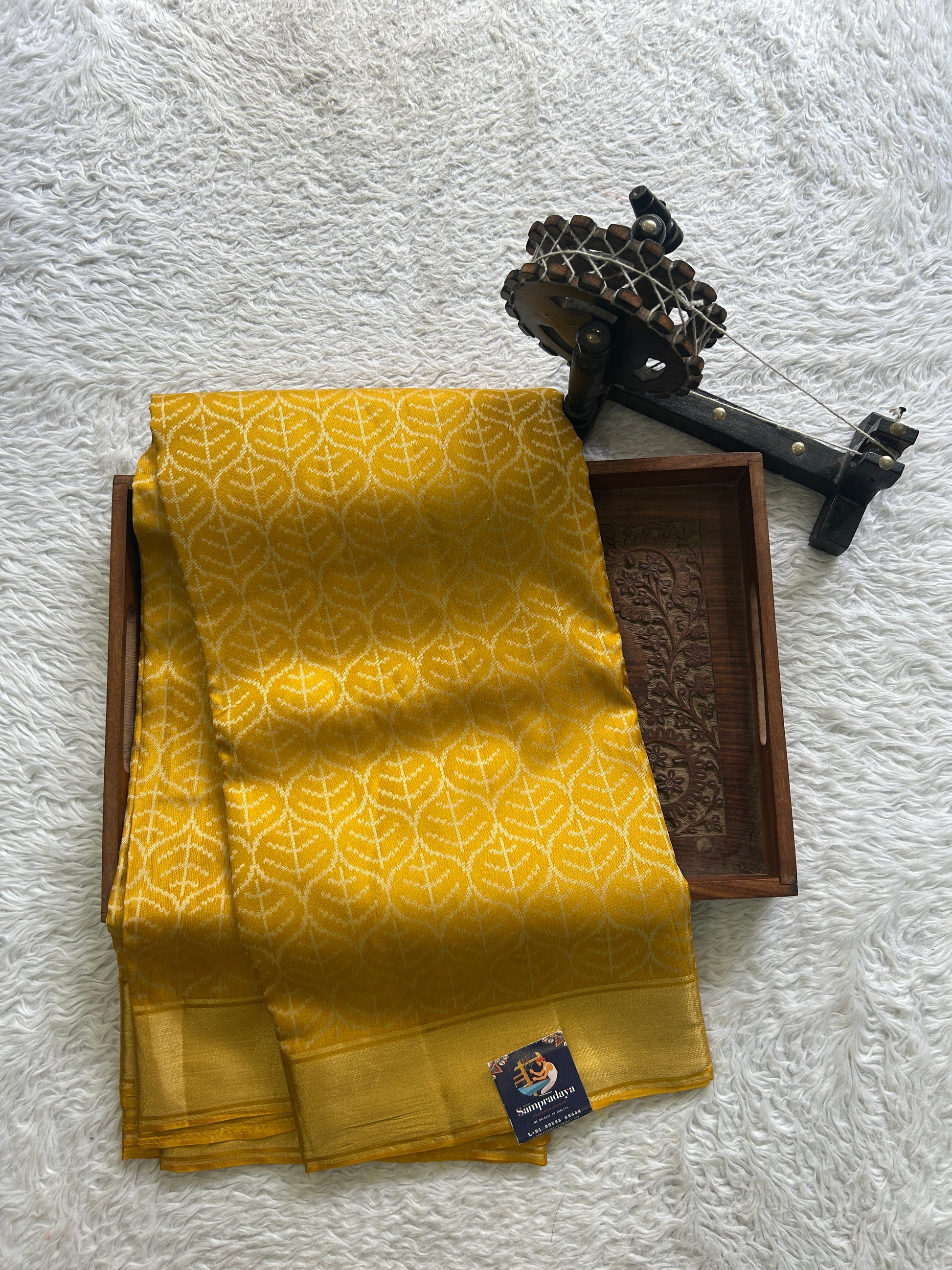 Dola Crepe Saree Dark Yellow Colored Elegantly Paired with a Zari Border. - Sampradaya Designer Studio