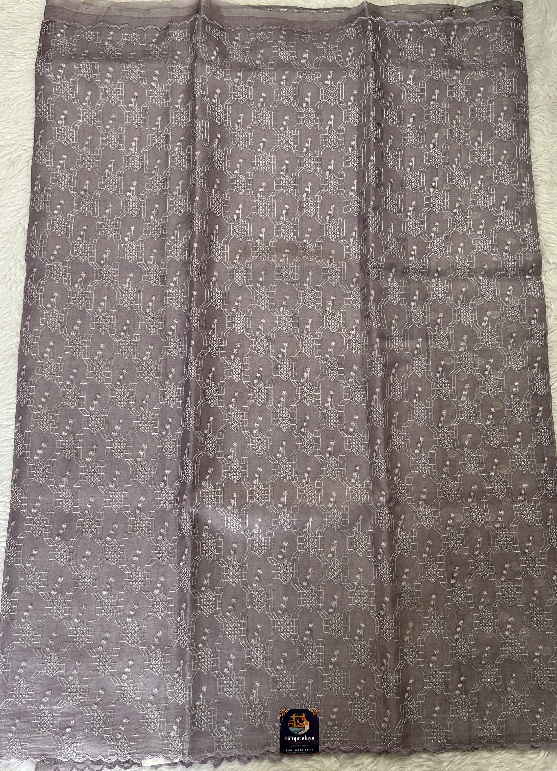 Banarasi Kora Silk Saree Light Lavender Colored Complemented with a Scallop Border. - Sampradaya Designer Studio