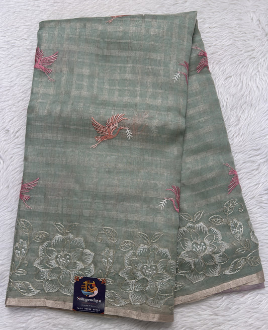 Banarasi Kora Silk Saree Light Green Colored Complemented with a Floral Zari Border. - Sampradaya Designer Studio