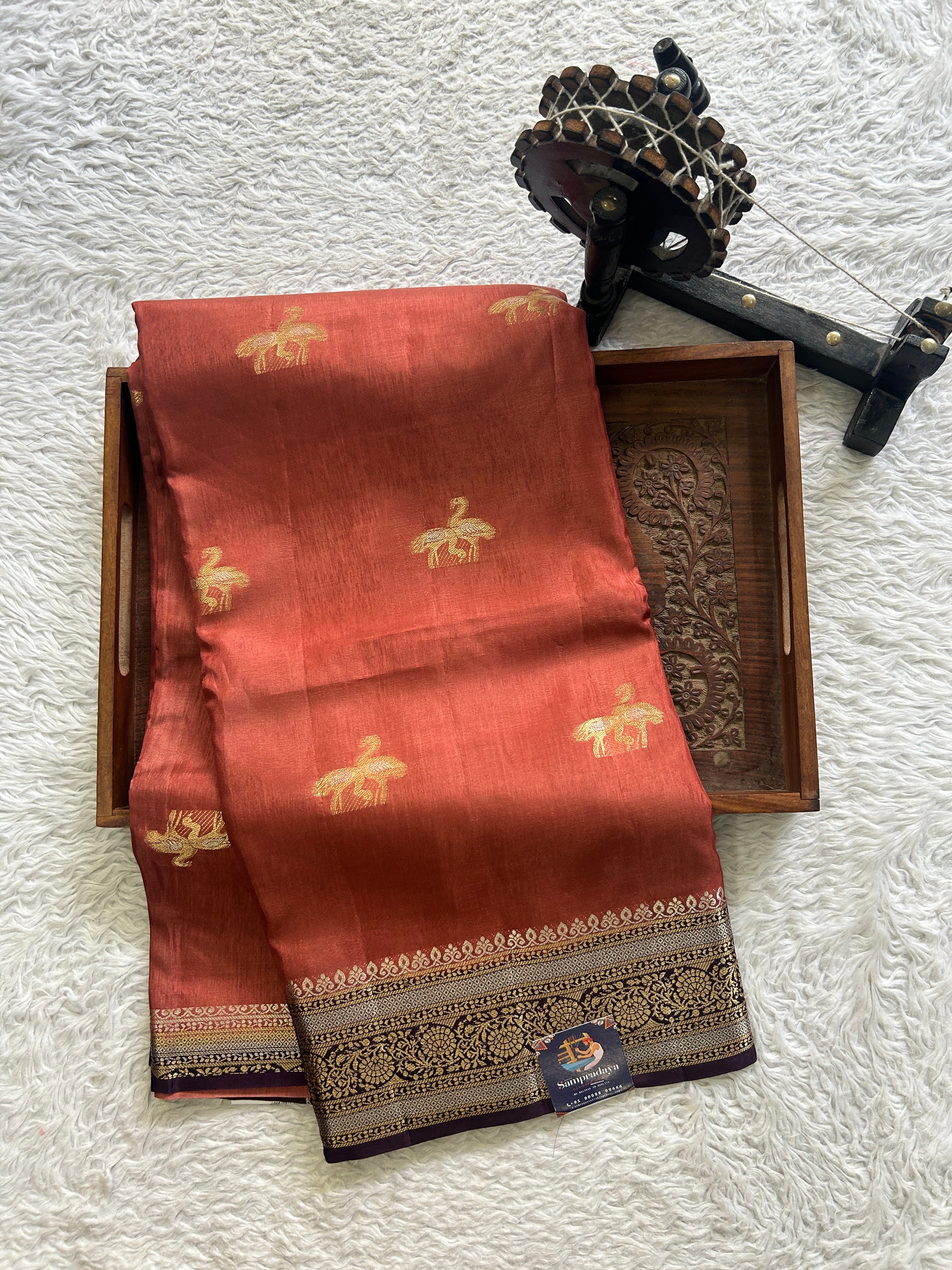 Satin Silk Saree Rust Colored Complemented with a Zari Border. - Sampradaya Designer Studio