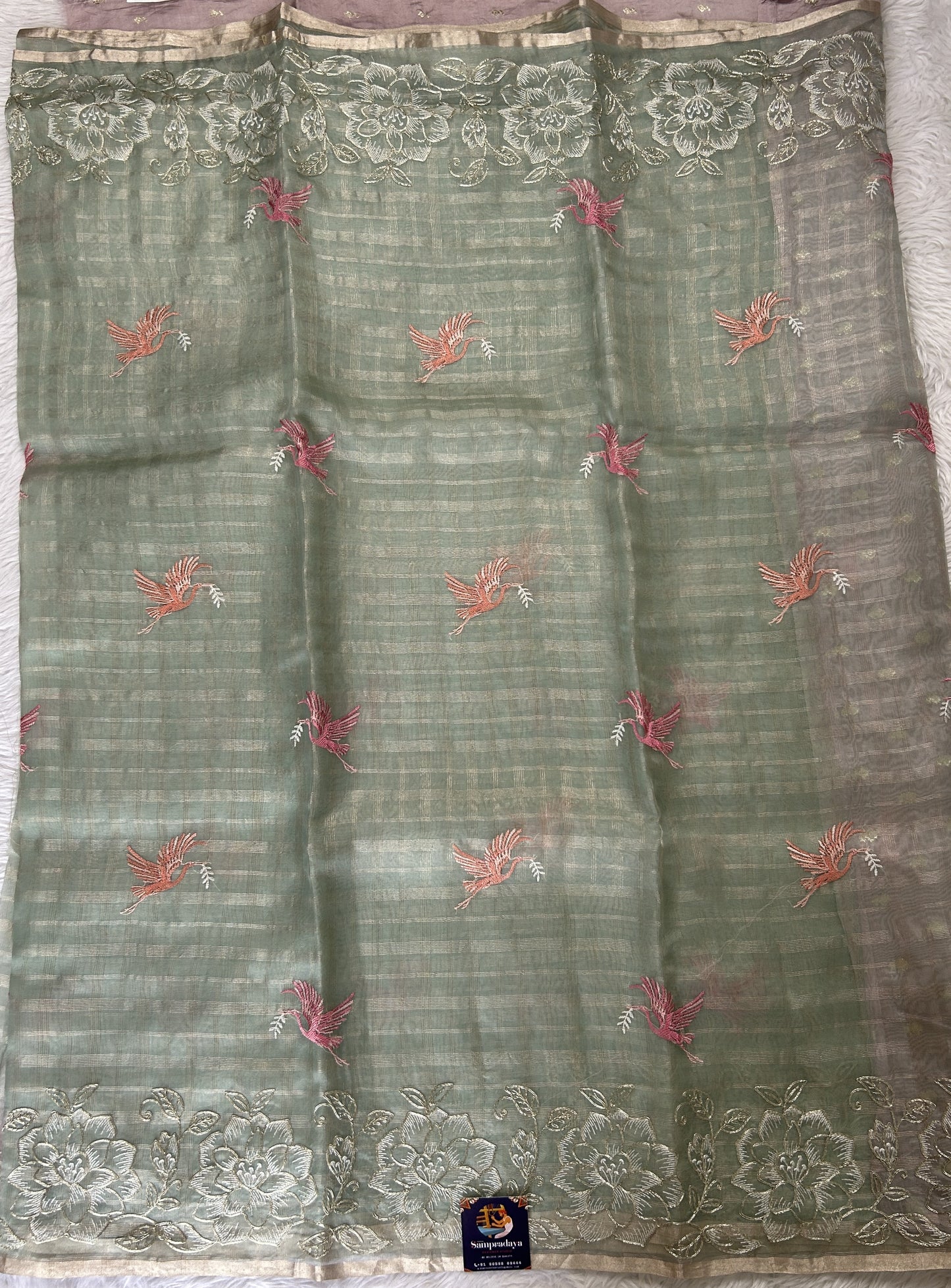 Banarasi Kora Silk Saree Light Green Colored Complemented with a Floral Zari Border. - Sampradaya Designer Studio