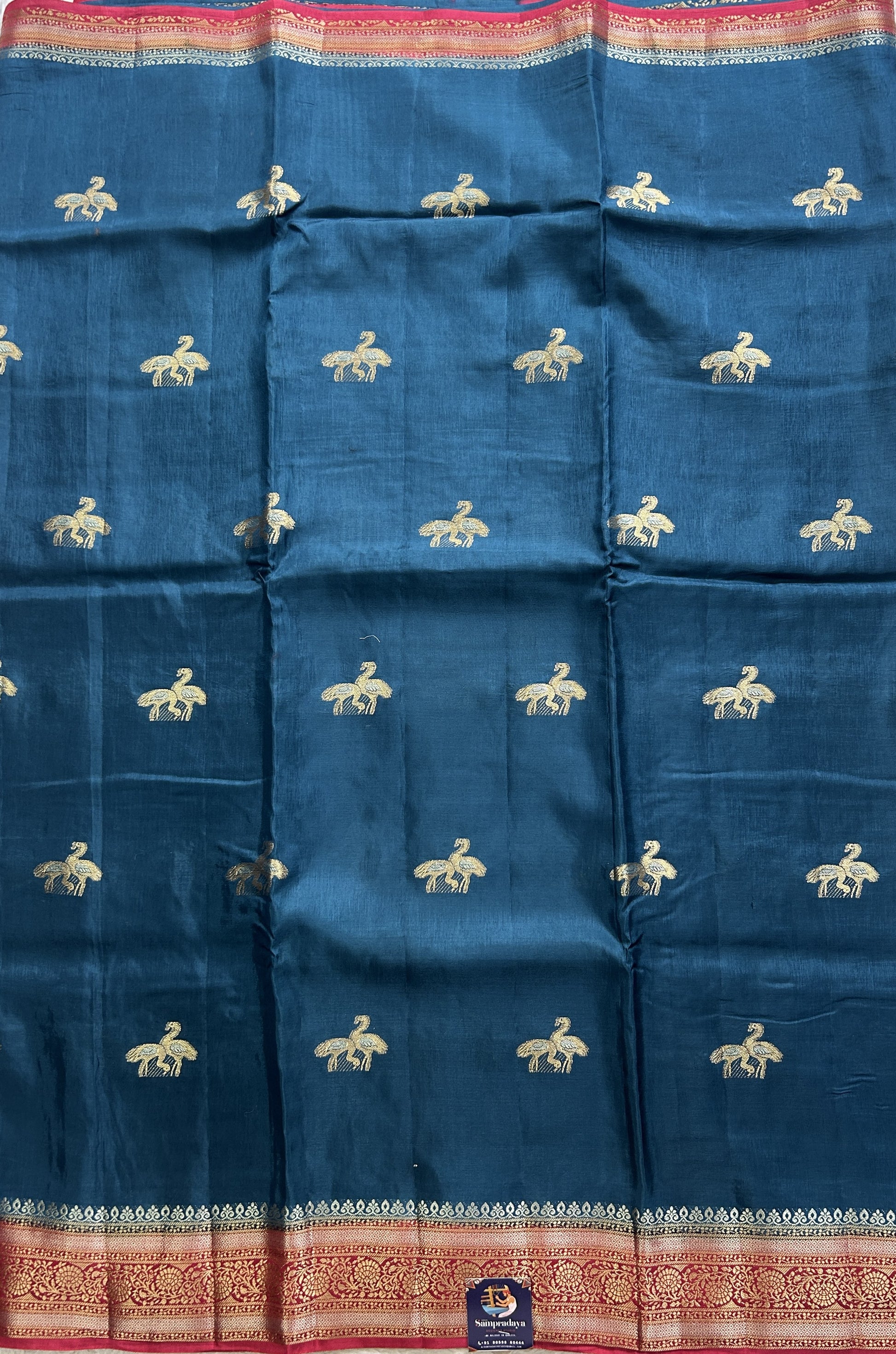 Satin Silk Saree Peacock Blue Colored Complemented with a Zari Border. - Sampradaya Designer Studio