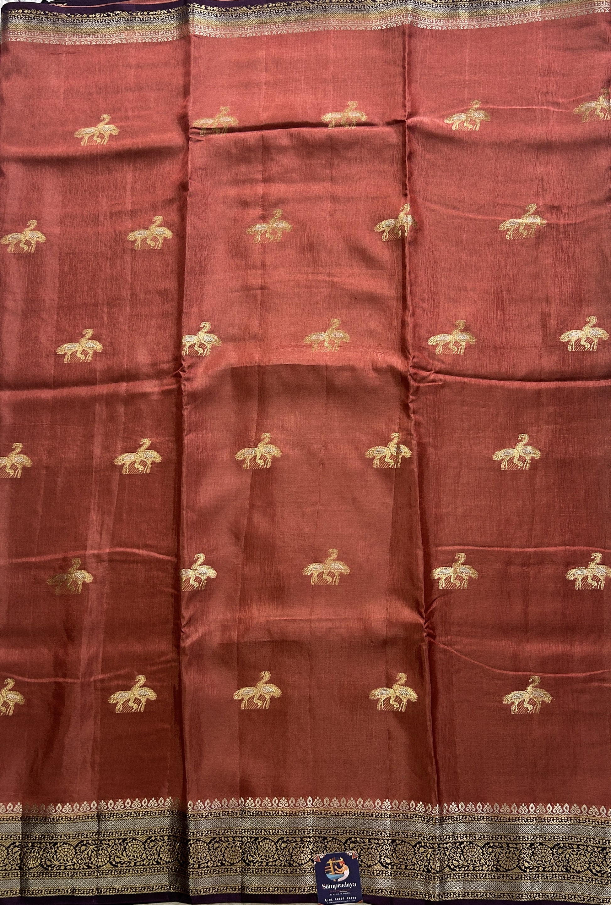 Satin Silk Saree Rust Colored Complemented with a Zari Border. - Sampradaya Designer Studio