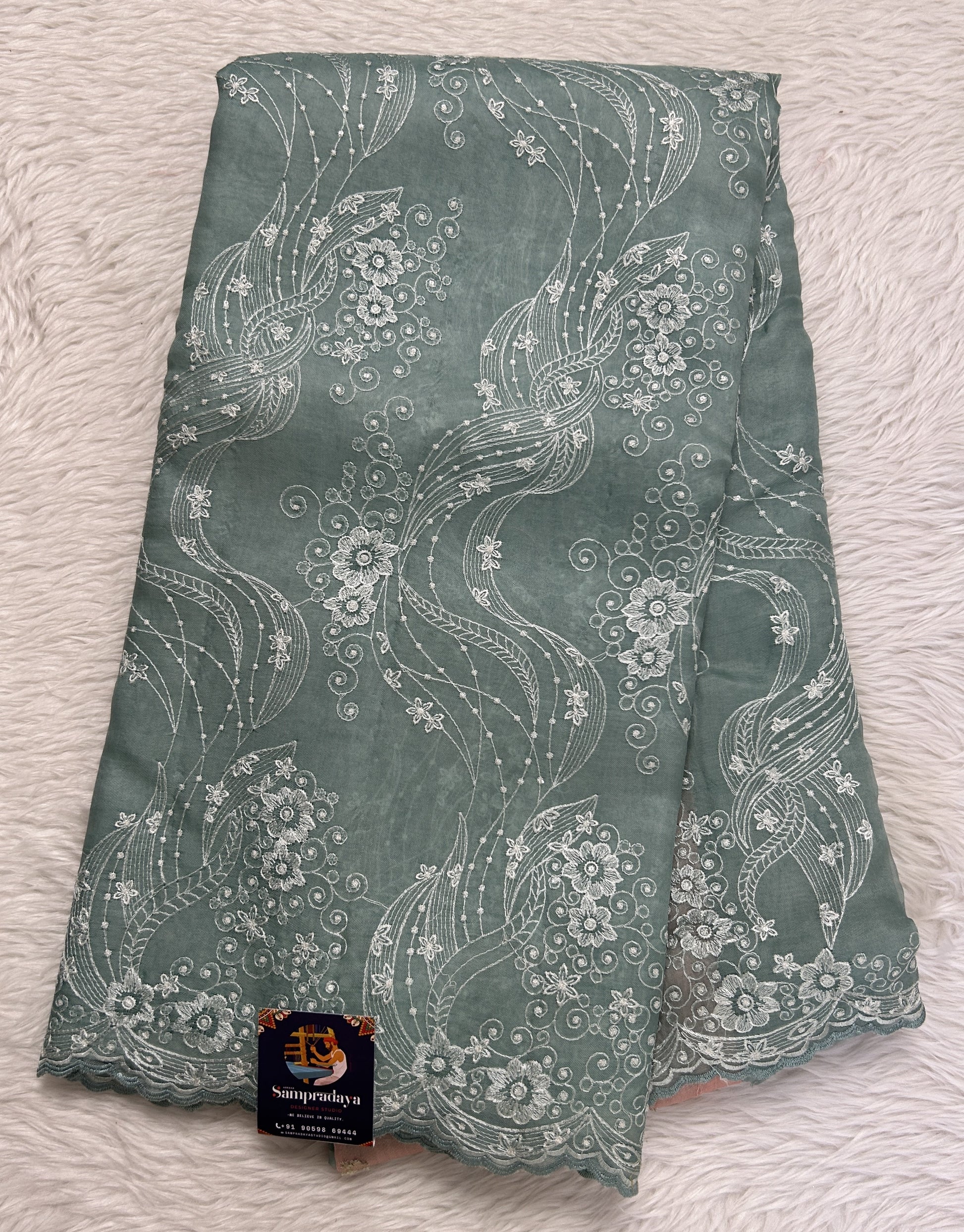 Banarasi Kora Silk Saree Sea Blue Colored Complemented with a Scallop Border. - Sampradaya Designer Studio