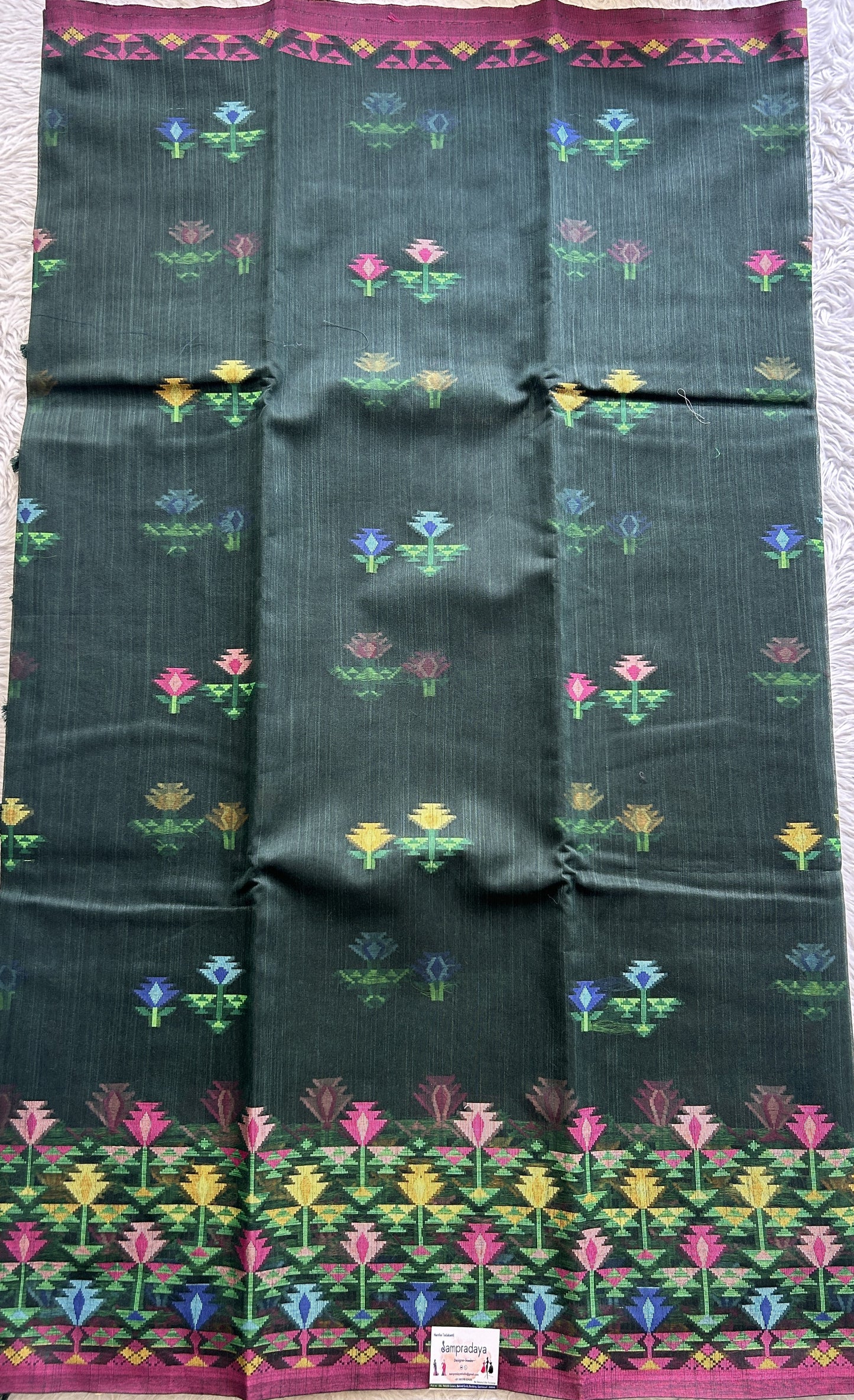 Semi Tussar Saree Bottle Green Colored Complemented with a Thread Border. - Sampradaya Designer Studio