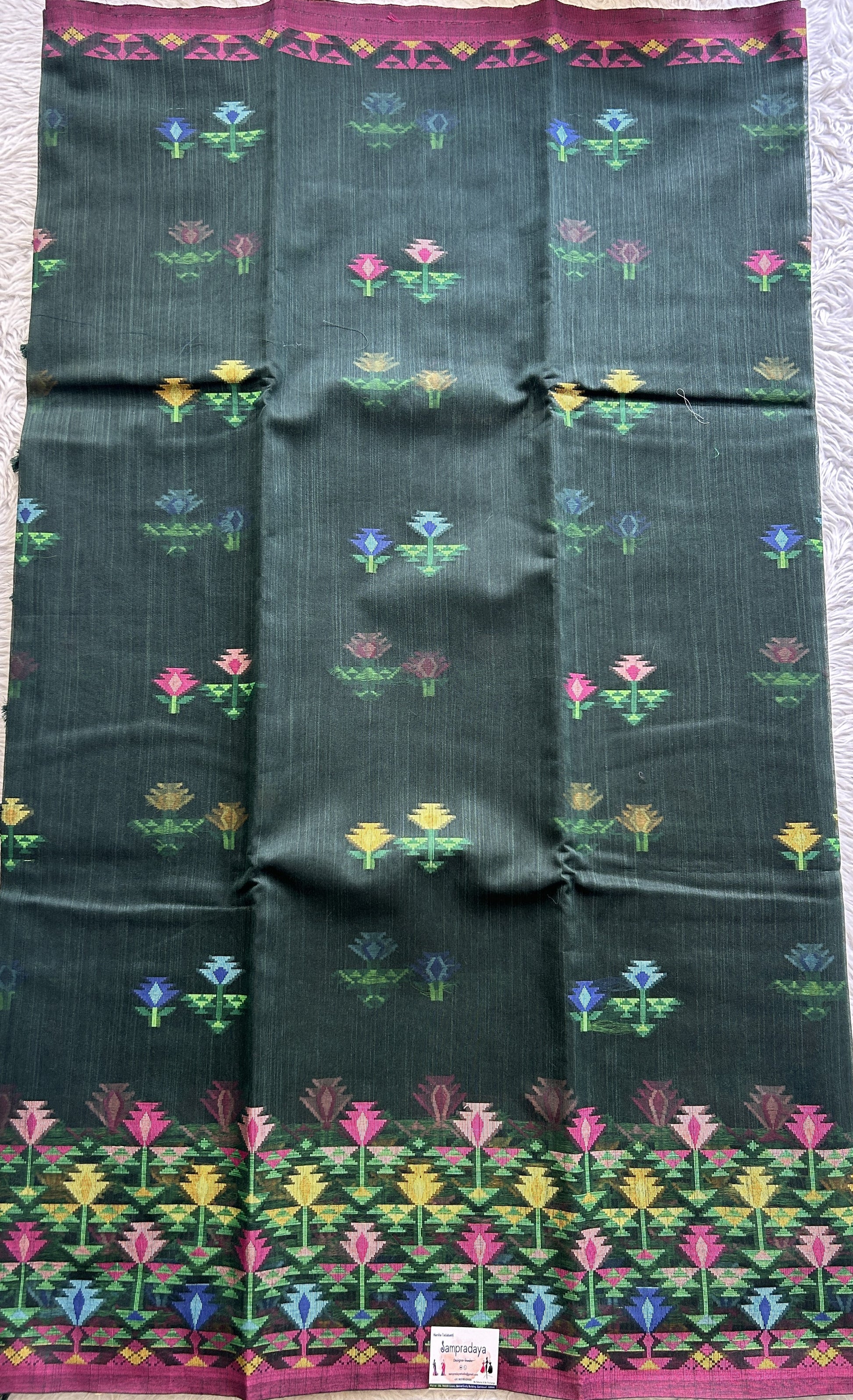 Semi Tussar Saree Bottle Green Colored Complemented with a Thread Border. - Sampradaya Designer Studio