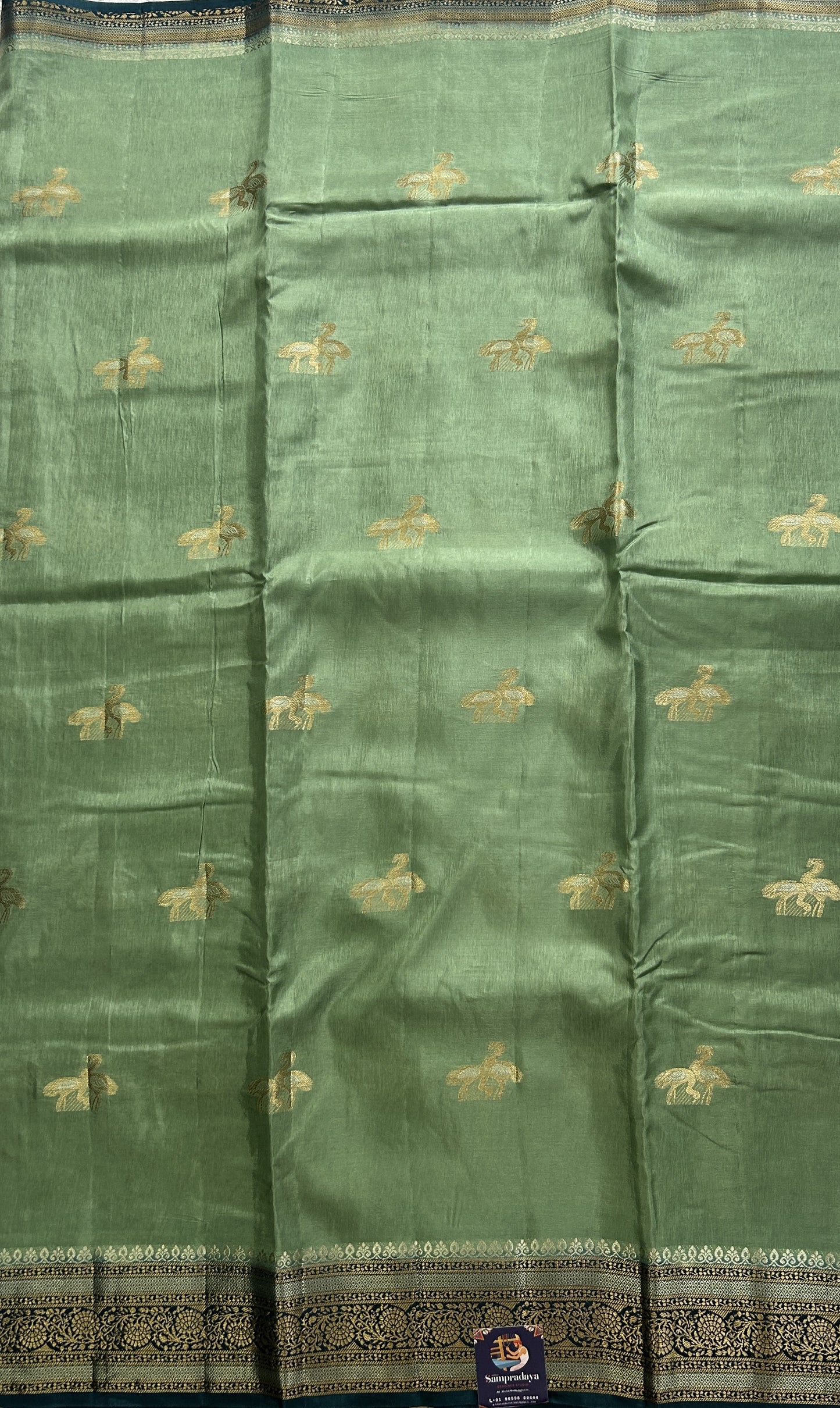 Satin Silk Saree Mint Green Colored Complemented with Zari Border. - Sampradaya Designer Studio