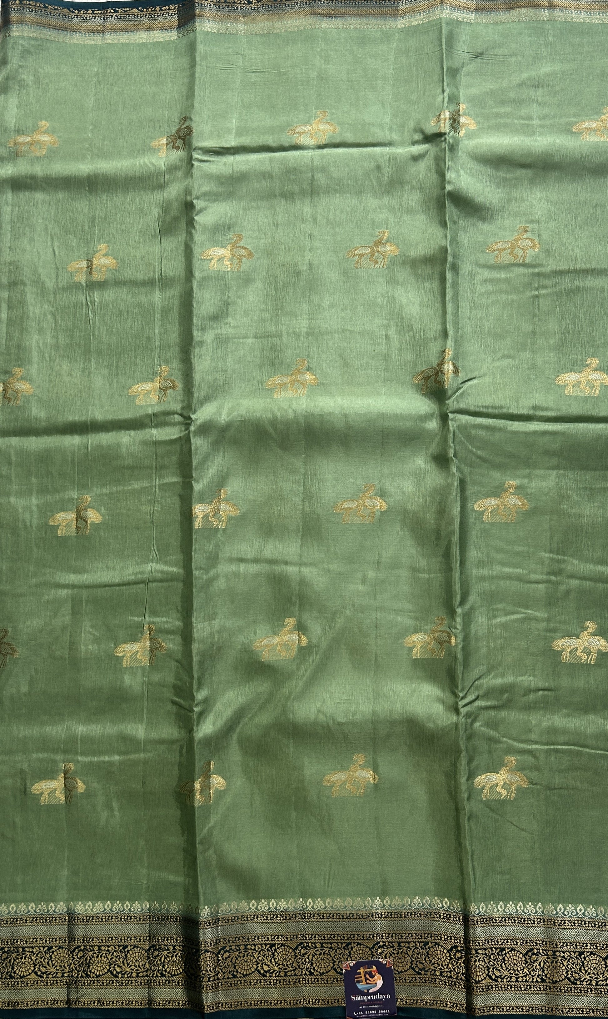 Satin Silk Saree Mint Green Colored Complemented with Zari Border. - Sampradaya Designer Studio