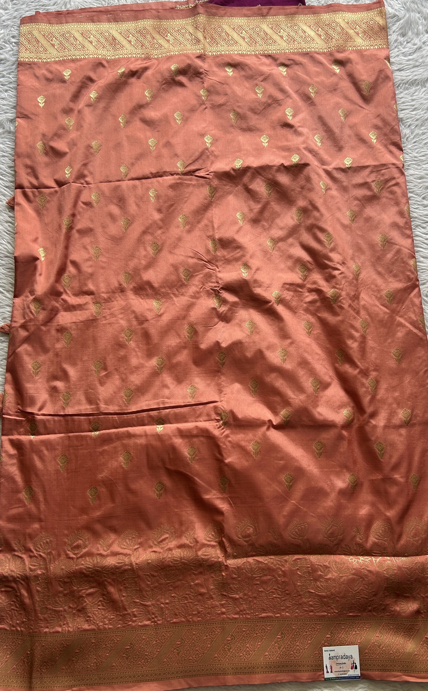 Semi Raw Silk Saree Peach Colored Complemented with a Zari Border. - Sampradaya Designer Studio