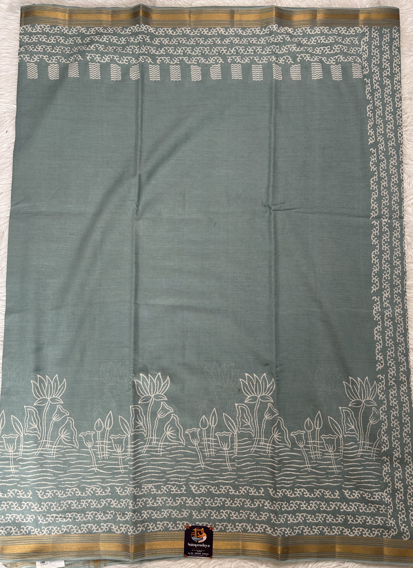 Banarasi Cotton Saree Sea Blue Colored Complemented with a Zari Border. - Sampradaya Designer Studio