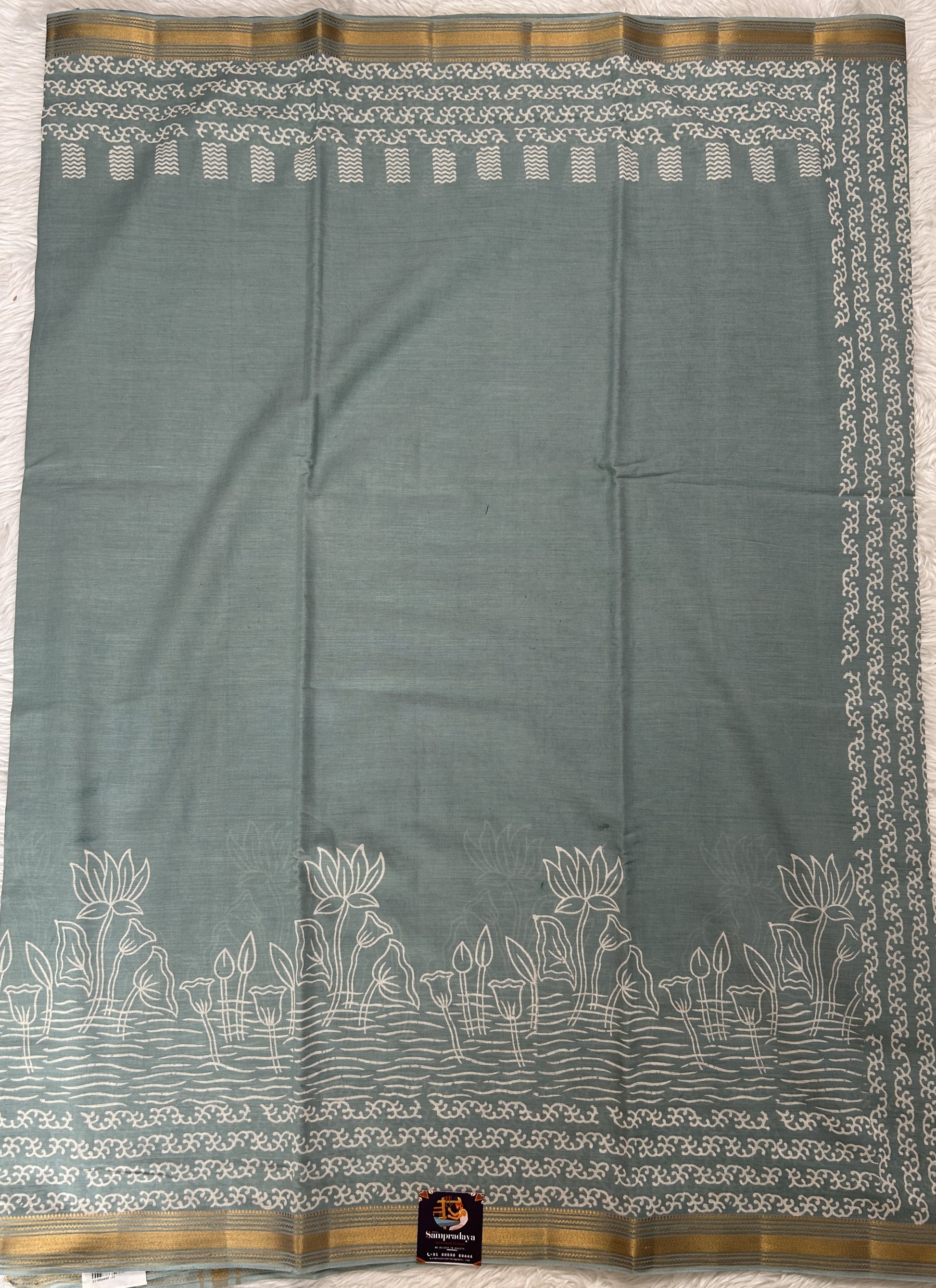 Banarasi Cotton Saree Sea Blue Colored Complemented with a Zari Border. - Sampradaya Designer Studio