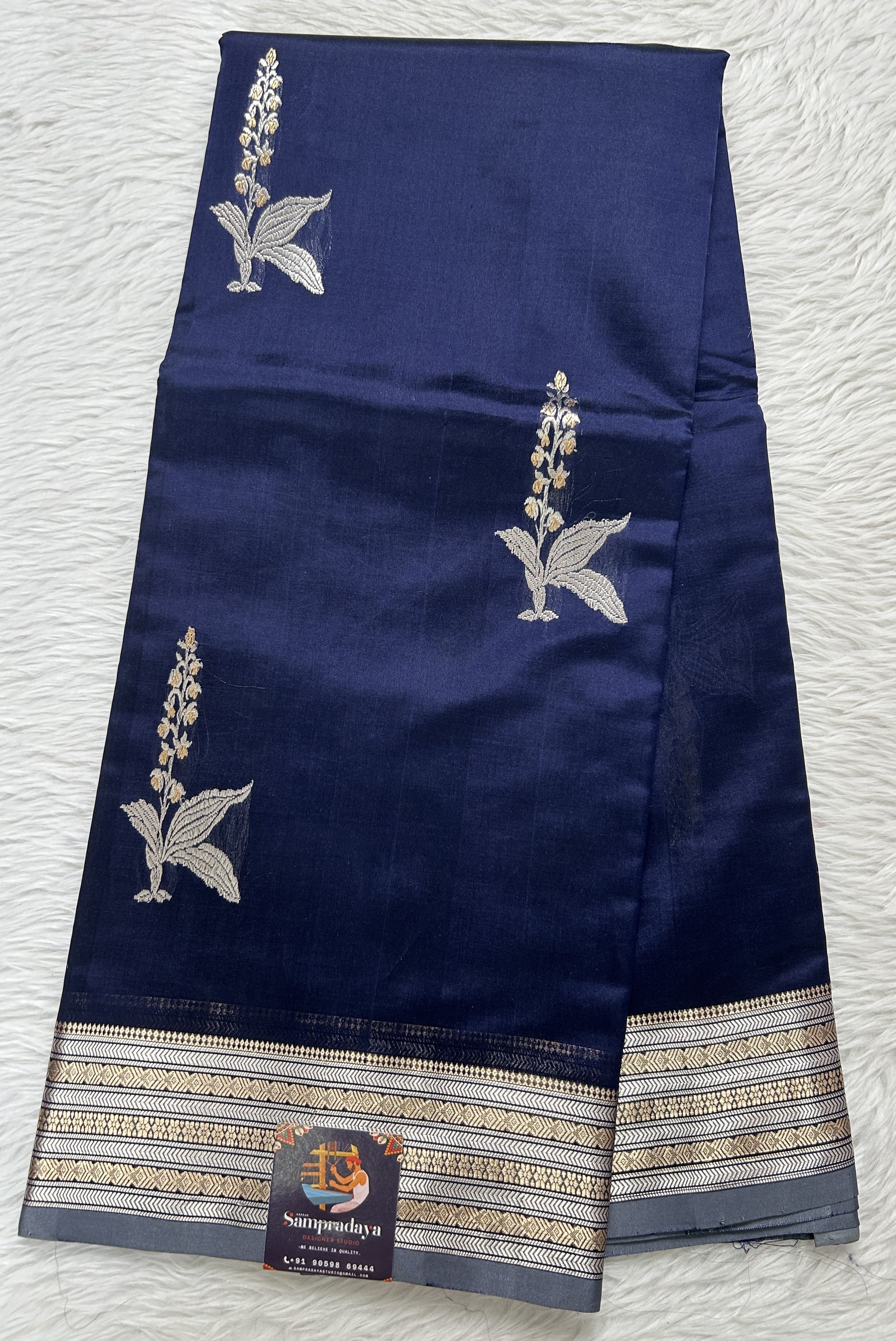 Banarasi Katan Silk Saree Ink Blue Colored Complemented with a Zari border. - Sampradaya Designer Studio
