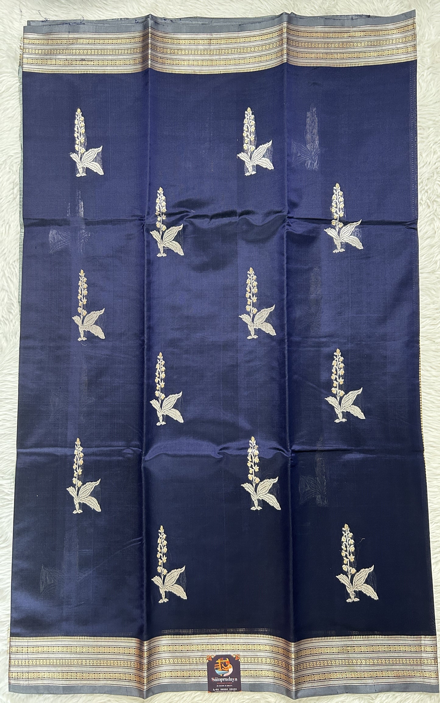 Banarasi Katan Silk Saree Ink Blue Colored Complemented with a Zari border. - Sampradaya Designer Studio