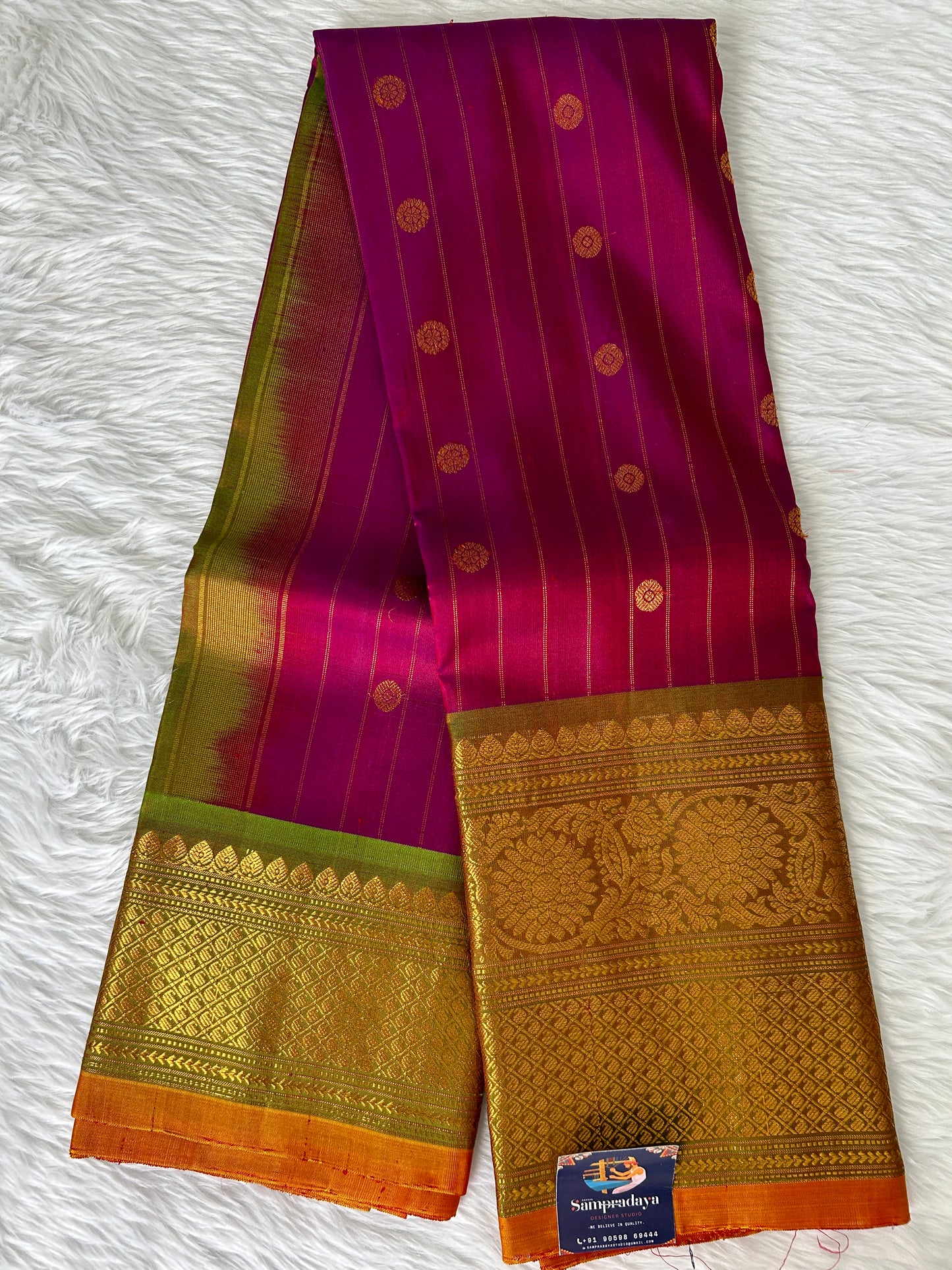 Gadwal Pattu Saree Purple Colored Complemented With a Mehndi Green Kanchi Border - Sampradaya Designer Studio