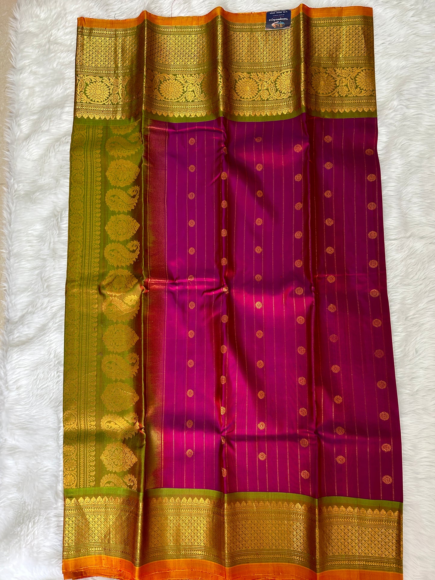 Gadwal Pattu Saree Purple Colored Complemented With a Mehndi Green Kanchi Border - Sampradaya Designer Studio