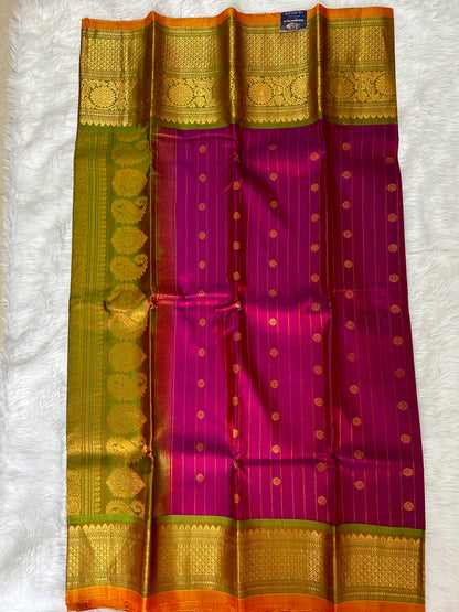 Gadwal Pattu Saree Purple Colored Complemented With a Mehndi Green Kanchi Border - Sampradaya Designer Studio