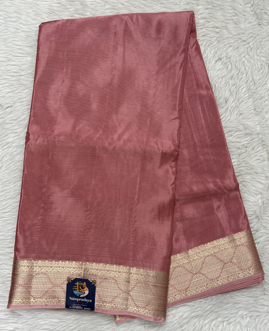 Satin Georgette Saree Soft Pink Colored Complemented with a Zari Border. - Sampradaya Designer Studio
